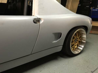 Illustration for article titled Would You Go $9,800 For This Widebody, Subaru-Powered 1972 Porsche 914?